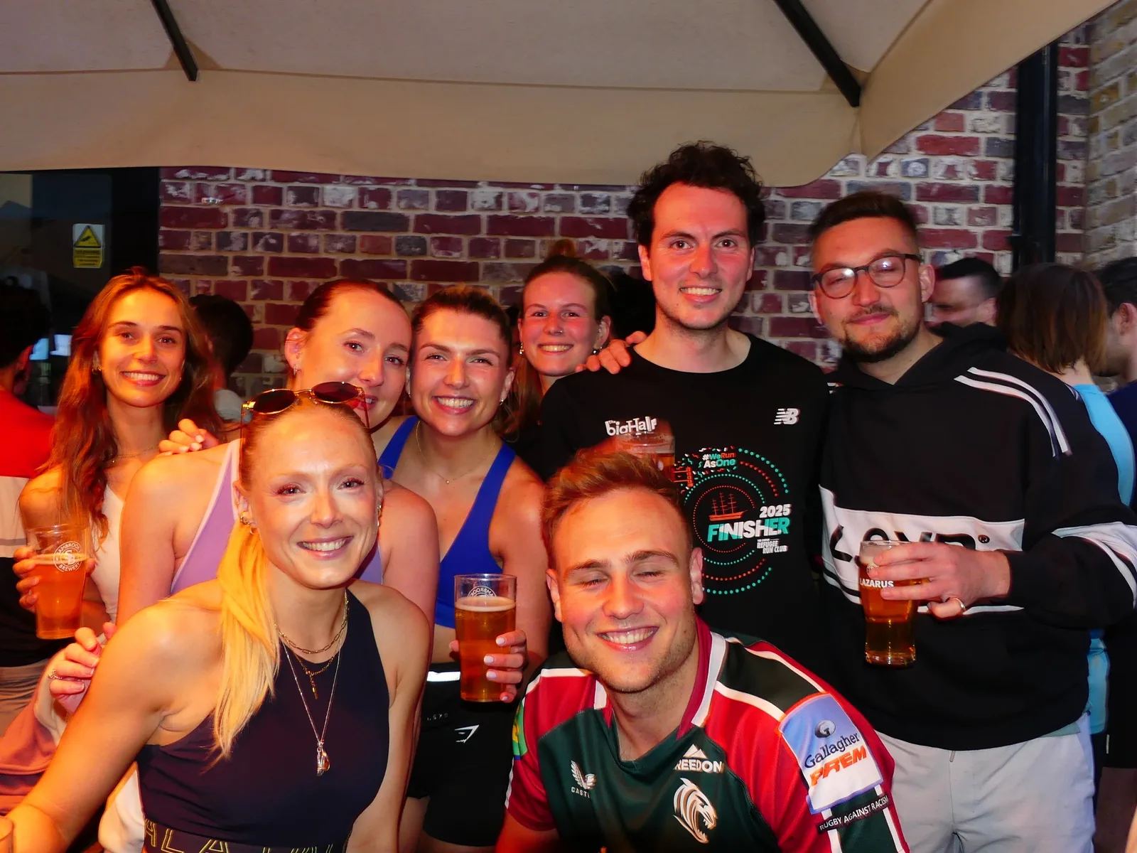 Runners socialising together after a club run